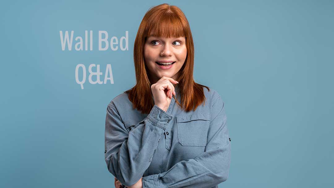 woman touching chin thinking about wall bed questions